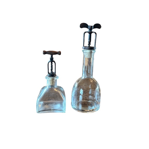Glass bottles set of 2 for decor. Tall one is 9” tall and short one is 6” tall - Picture 3 of 7